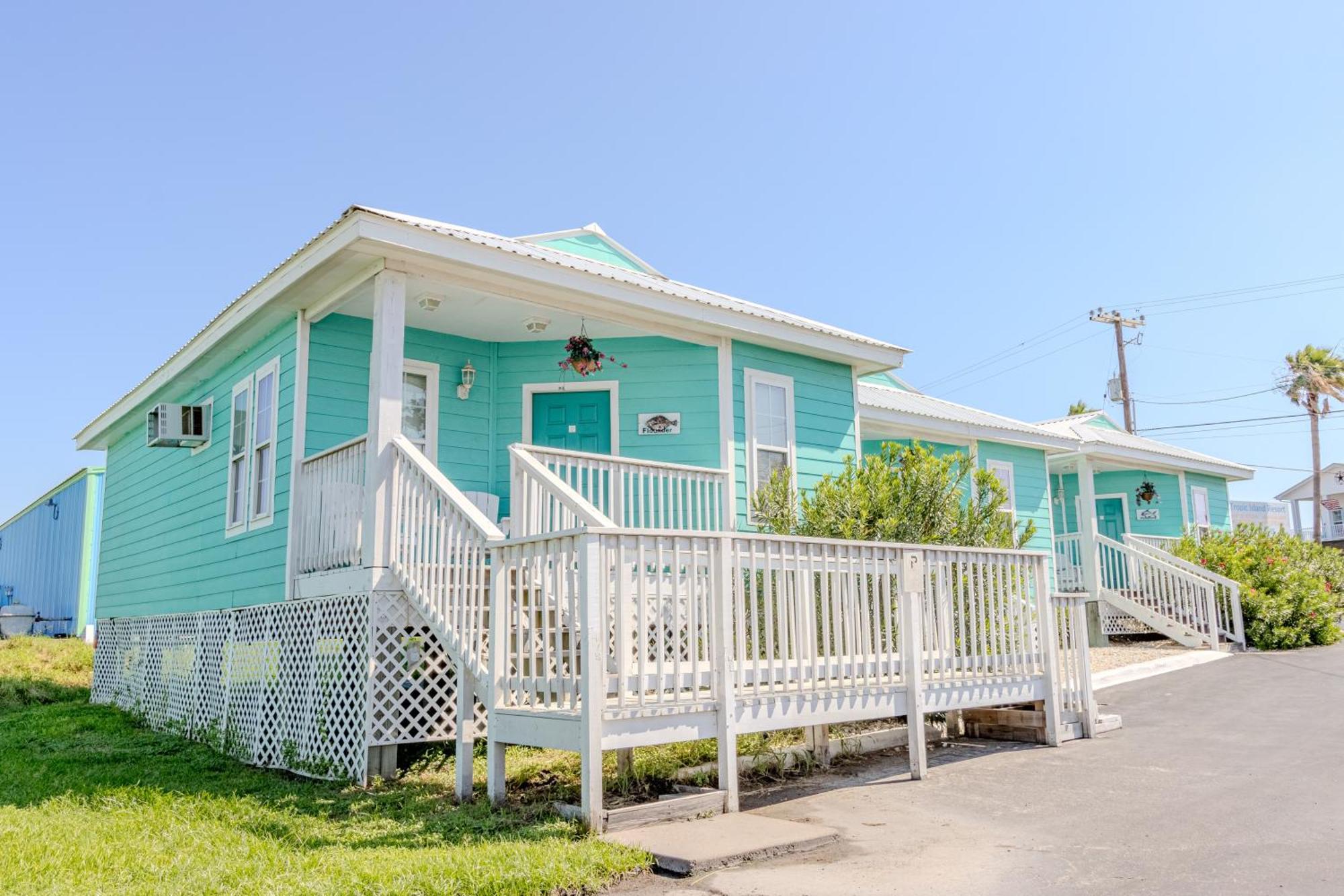 Shark Reef Resort Motel & Cottages พอร์ท อารานซัส ภายนอก รูปภาพ